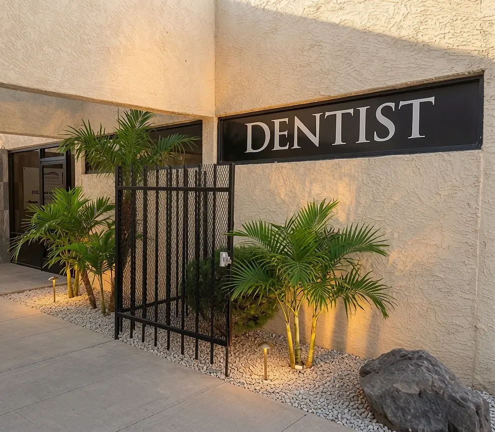 Entrance to 3rd Set Smiles in Tempe, Arizona — the DENTIST sign and Dr. Matthew Phillips, DDS placard